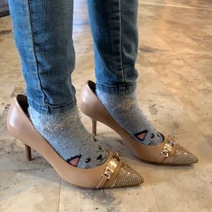 Coach tan leather kitten heels.